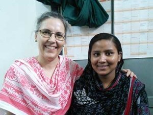 Woman and girl smiling